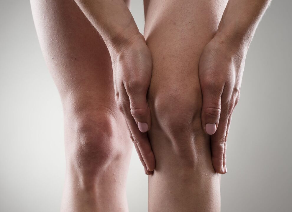 Osteoarthritis of the knee joint, manifesting as pain and stiffness